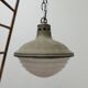 Patinated metal and glass Holophane pendant light