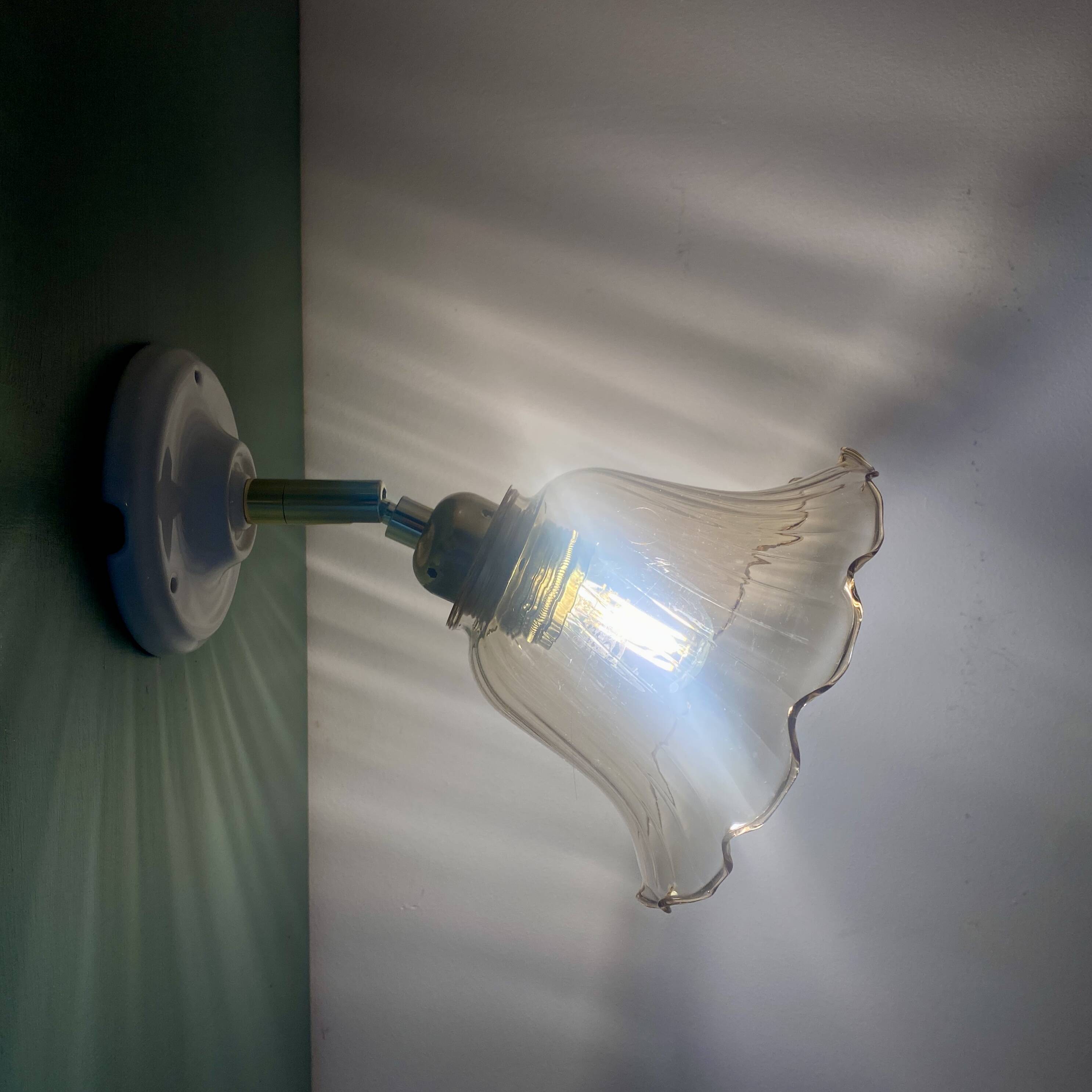 Vintage tulip wall light in amber glass