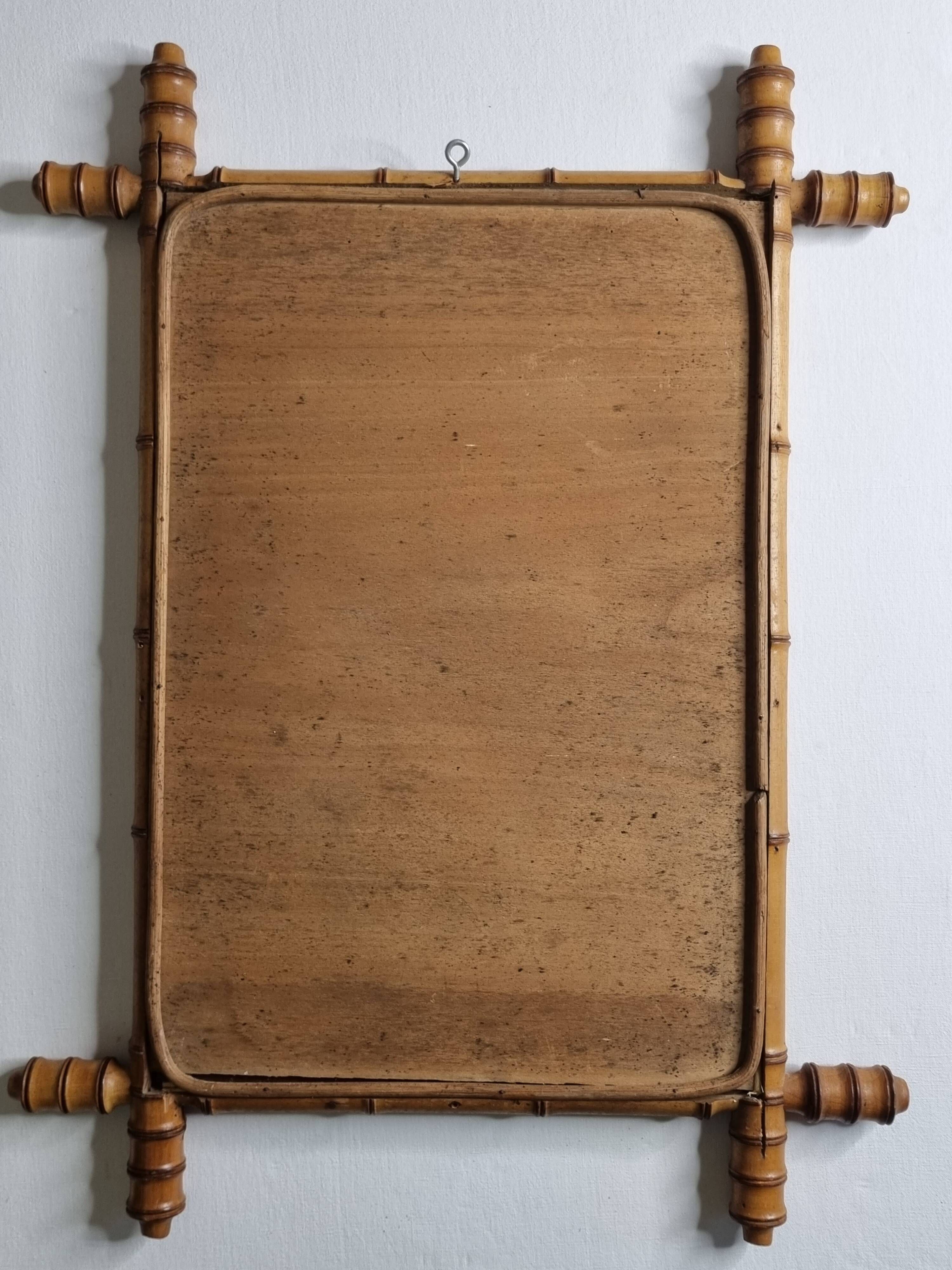 Antique mirror in turned wood, light bamboo style, late 19th century, 62 x 46 cm