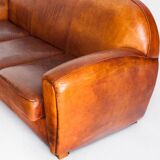 Vintage leather club sofa. Art Deco style. France, 1950s. (sofa convertible into bed)