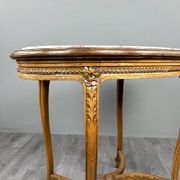 Oval guéridon table in carved wood and marble, Louis XVI style, 19th century.