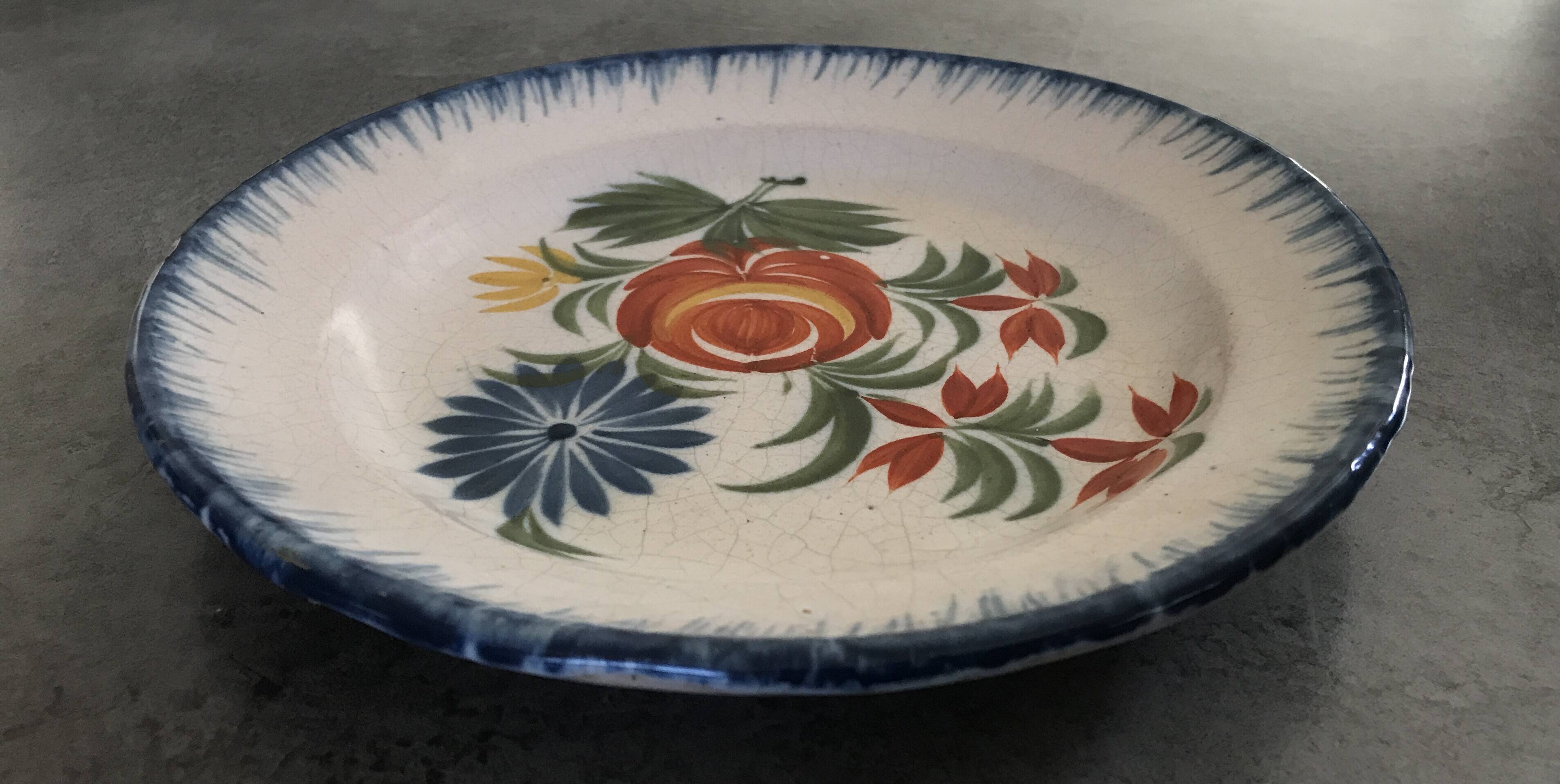 Old plate in auvillar earthenware, floral painting decoration, 19th century