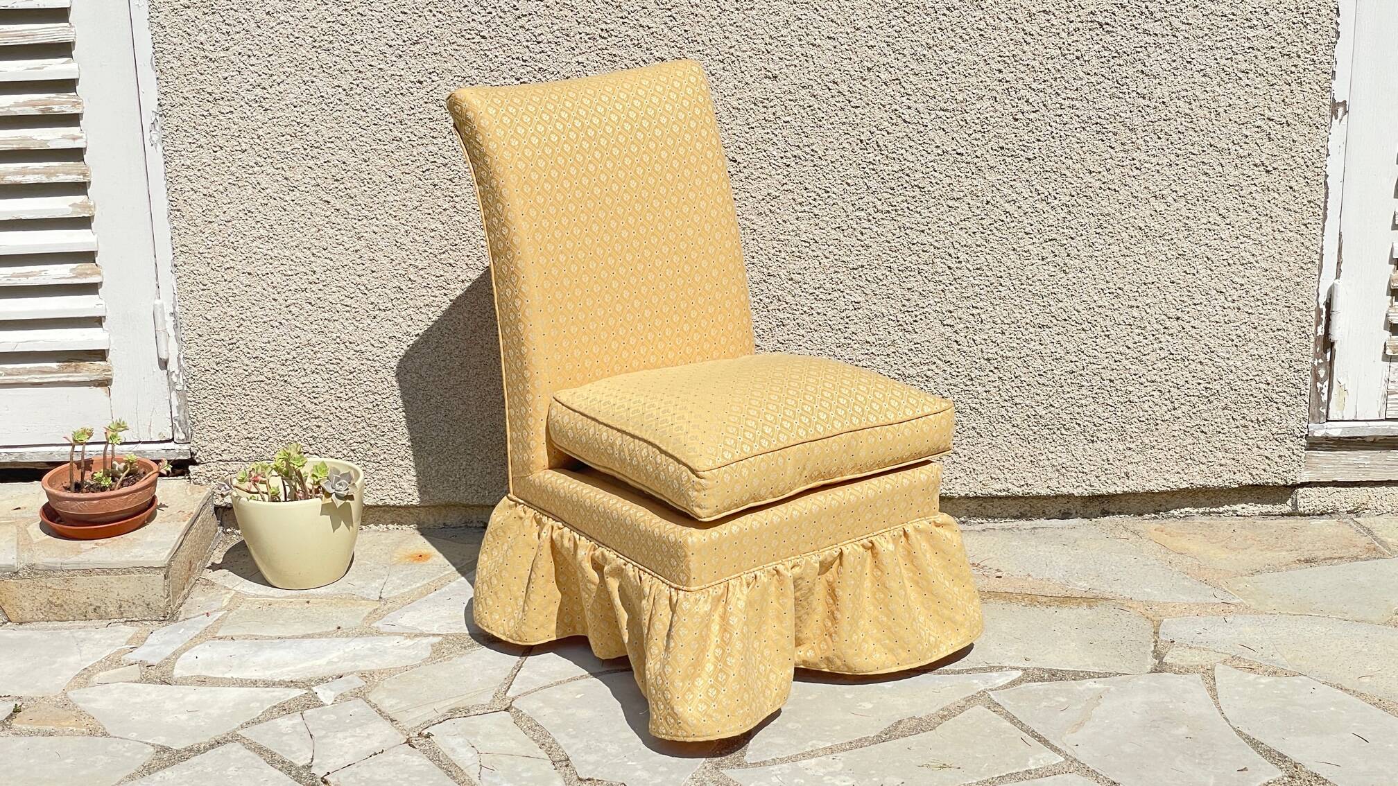 Vintage upholstered fabric toad armchair