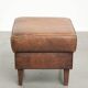 Sheepskin ottoman with a light brown colour scheme and a vintage look