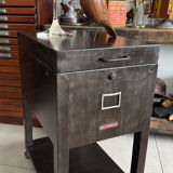 Old vintage industrial filing cabinet on wheels
