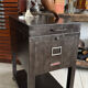 Vintage industrial filing cabinet on wheels