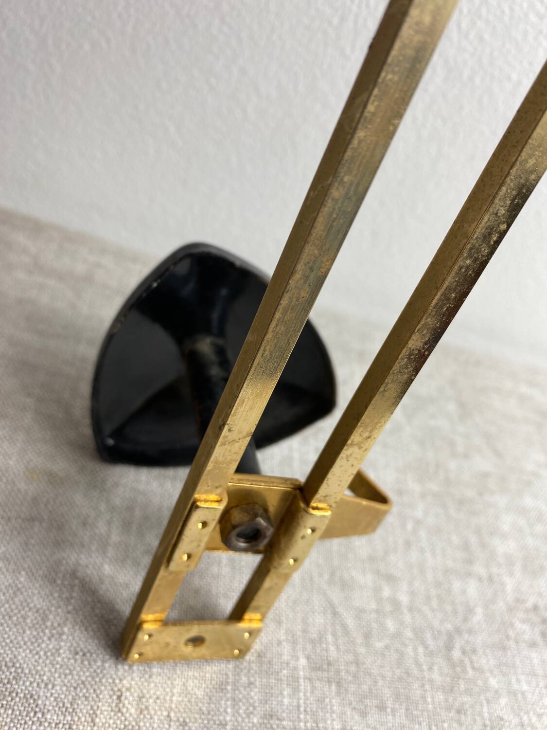 Wall-mounted coat rack with 3 hooks from the 1960s.