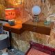 Suspended teak bedside tables in vintage 1960s Scandinavian style.