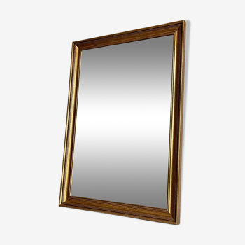 Golden wood frame mirror