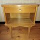 Blond wood bedside table