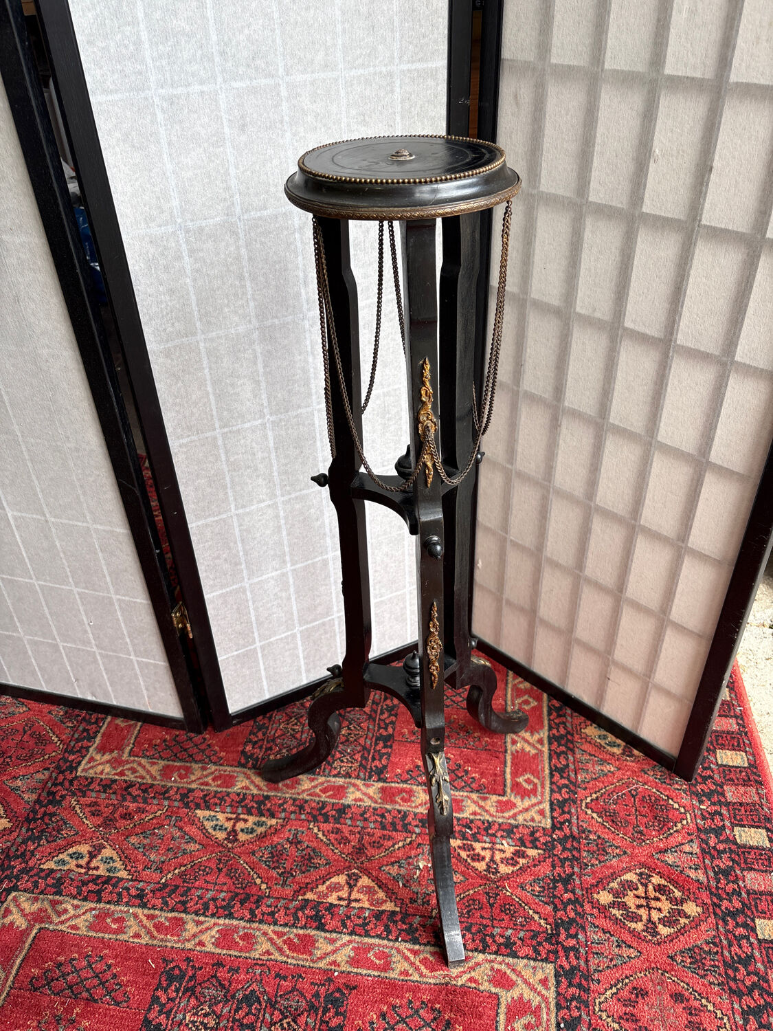 Napoleon III side table in blackened wood and bronze, decorated with chains, 19th century.