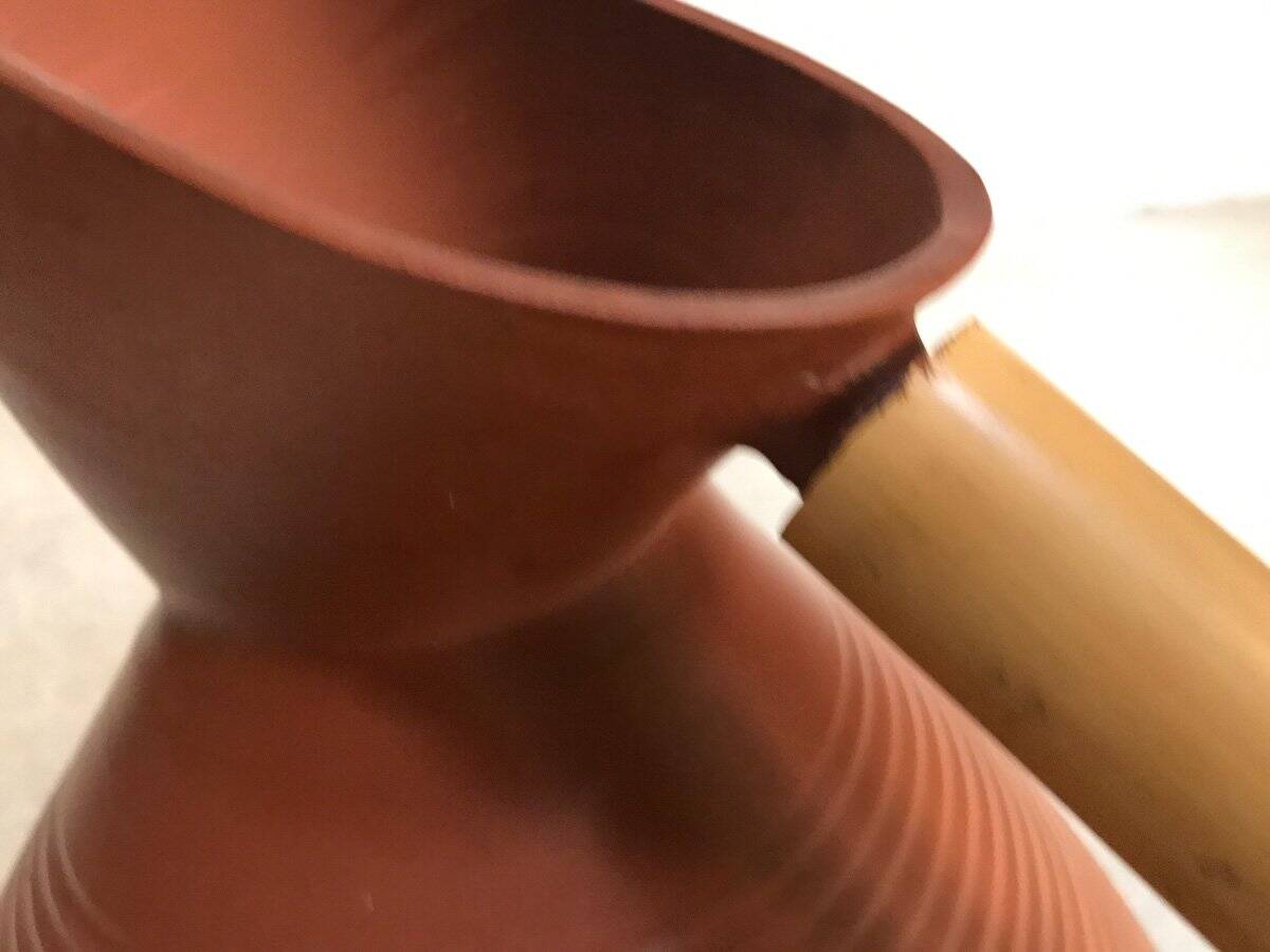 Studio pottery jug floor vase in terracotta and bamboo handle Germany 1950s