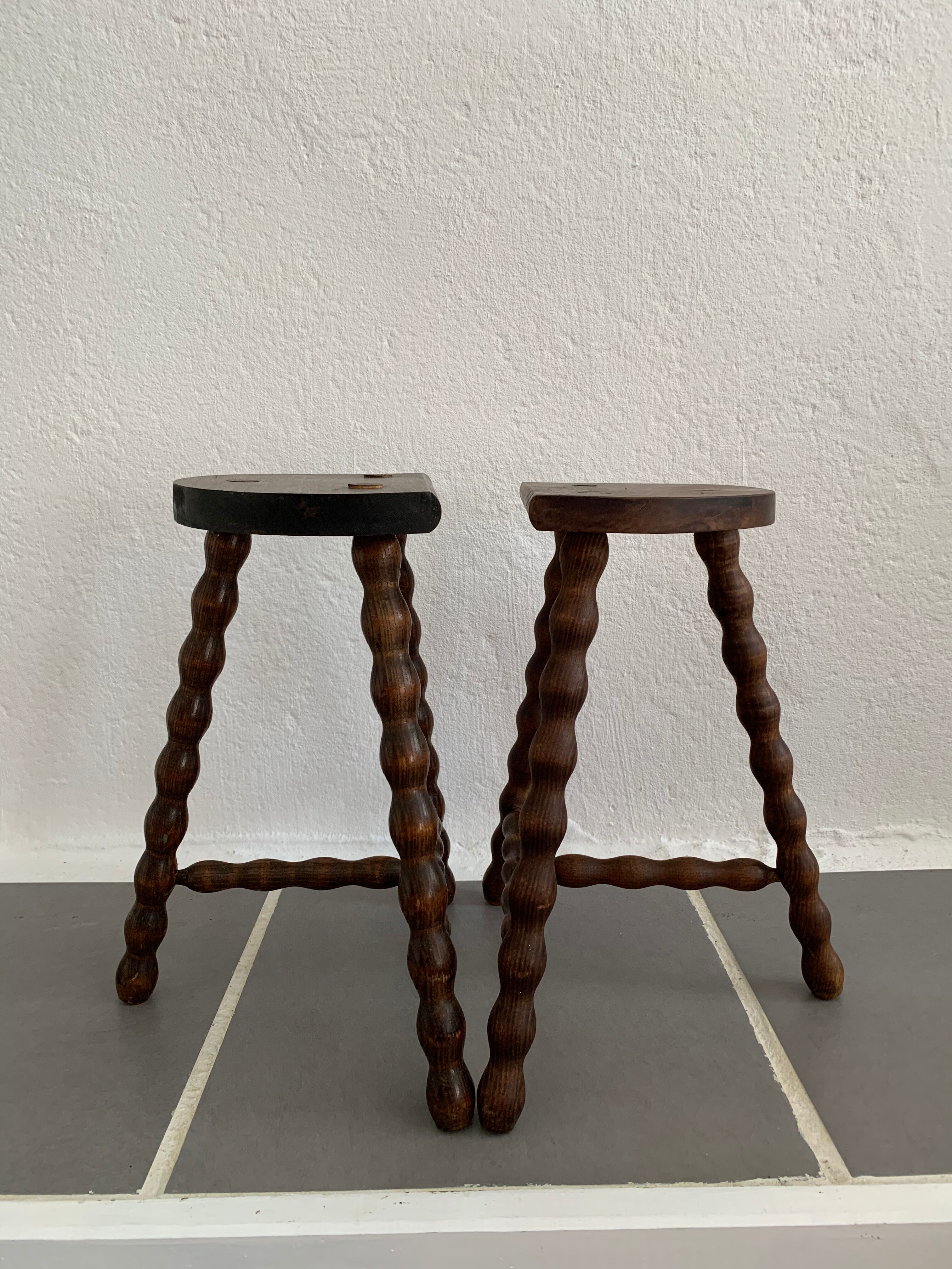 Pair of tripod stools turned wood