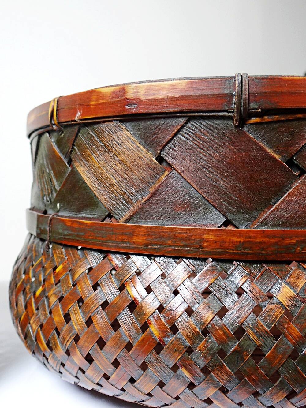 Pair of vintage nesting handmade Japanese woven bamboo baskets