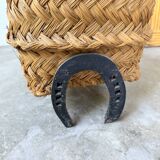 Magazine rack or log rack in straw with brutalist base from the 50s