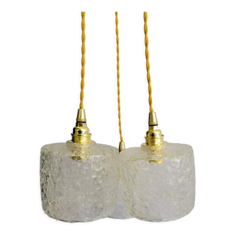 Trio of scrambled glass pendant lamps