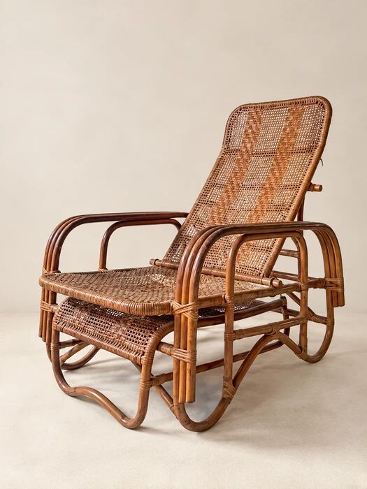 Mid-century adjustable rattan lounge chair with retractable footrest, Japan
