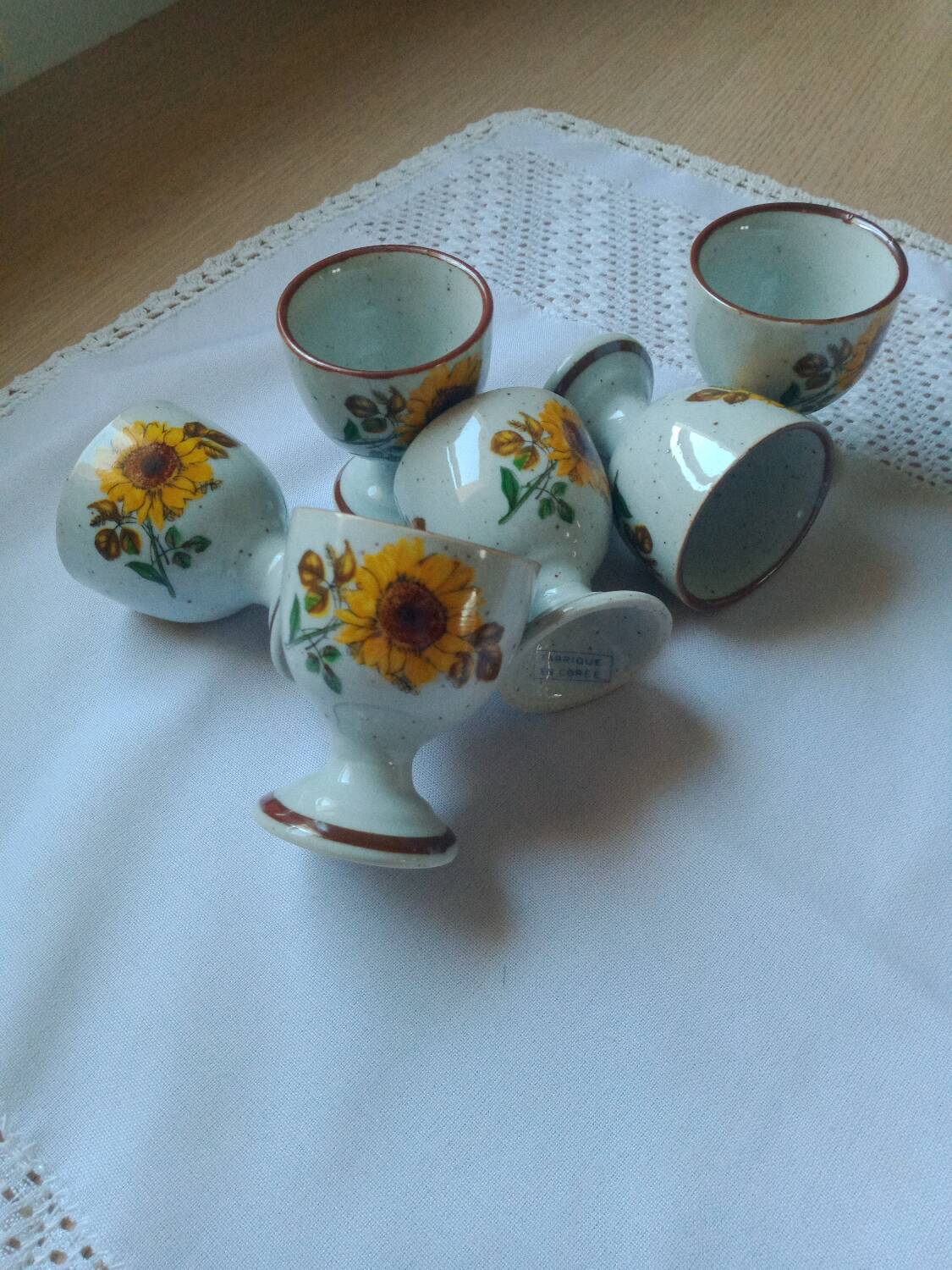Stoneware egg cups screen printed with sunflowers