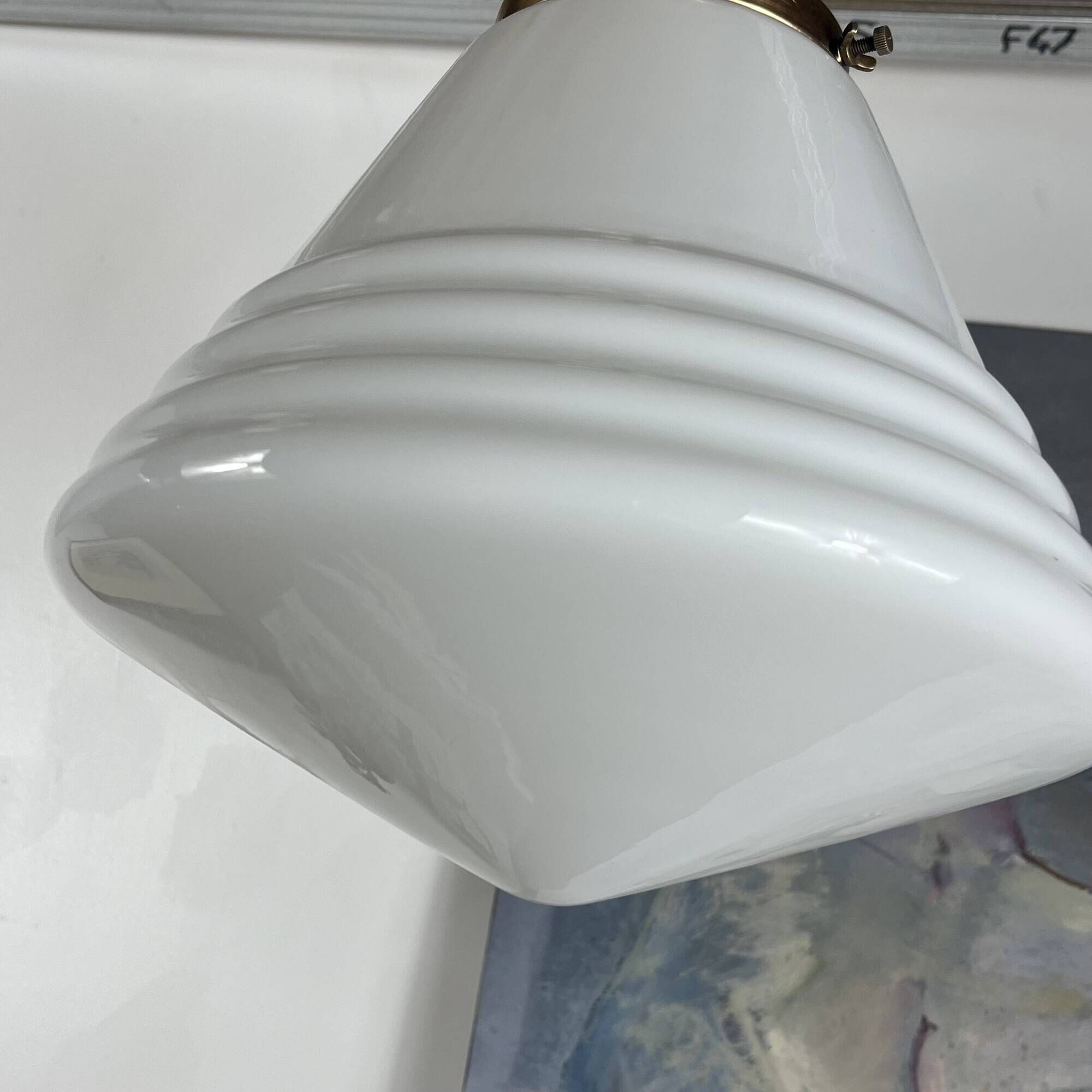 Pair of opaline glass pendant lights in white by Philips and brass from the 1920s.