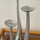Trio of vintage cast aluminum candlesticks