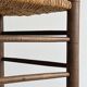 Triangular turned wooden stool