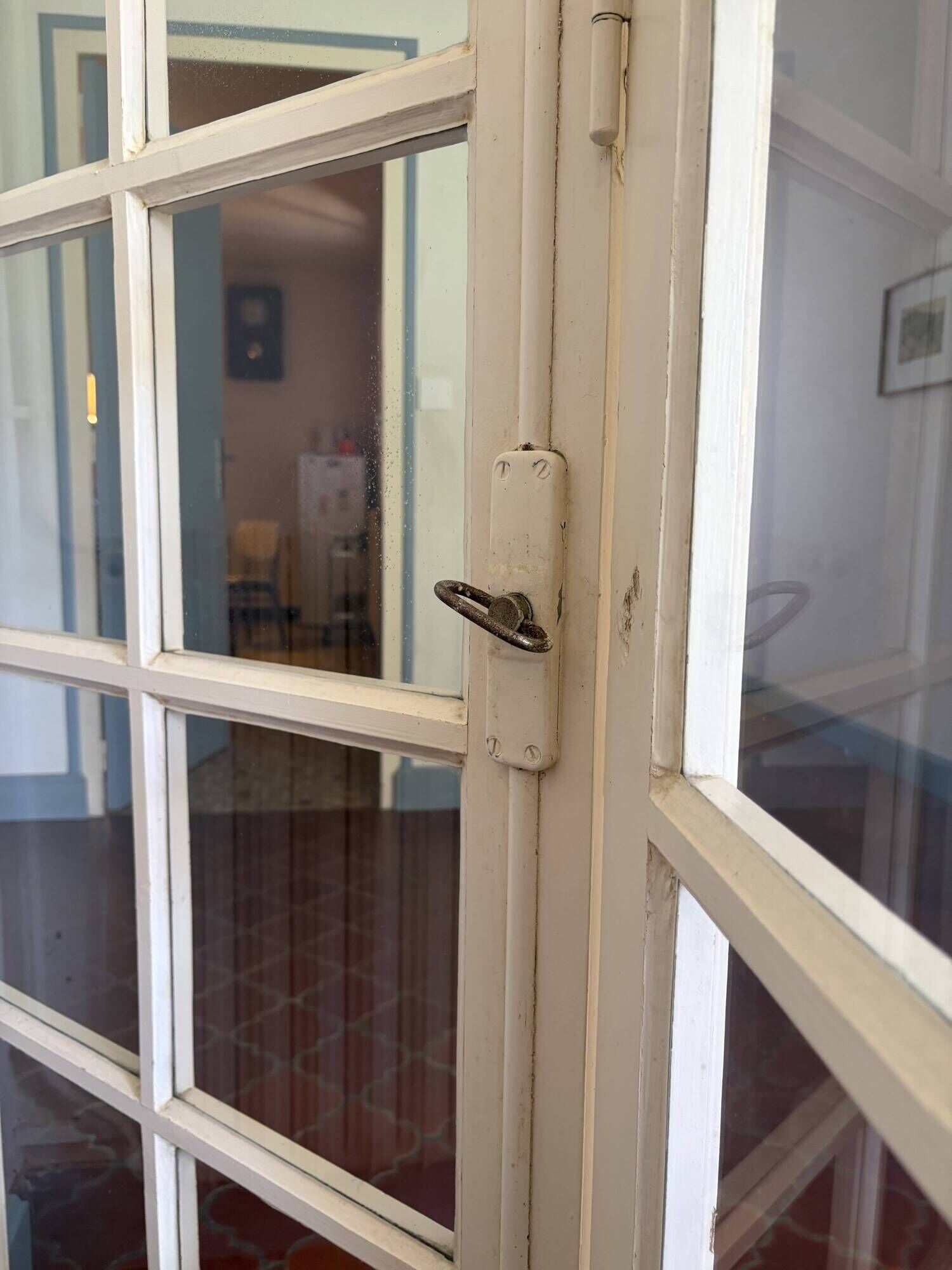 Triptych glass door with three panels featuring small panes. Vintage.