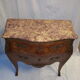 Commode galbée style Louis XVI marqueterie bois de rose