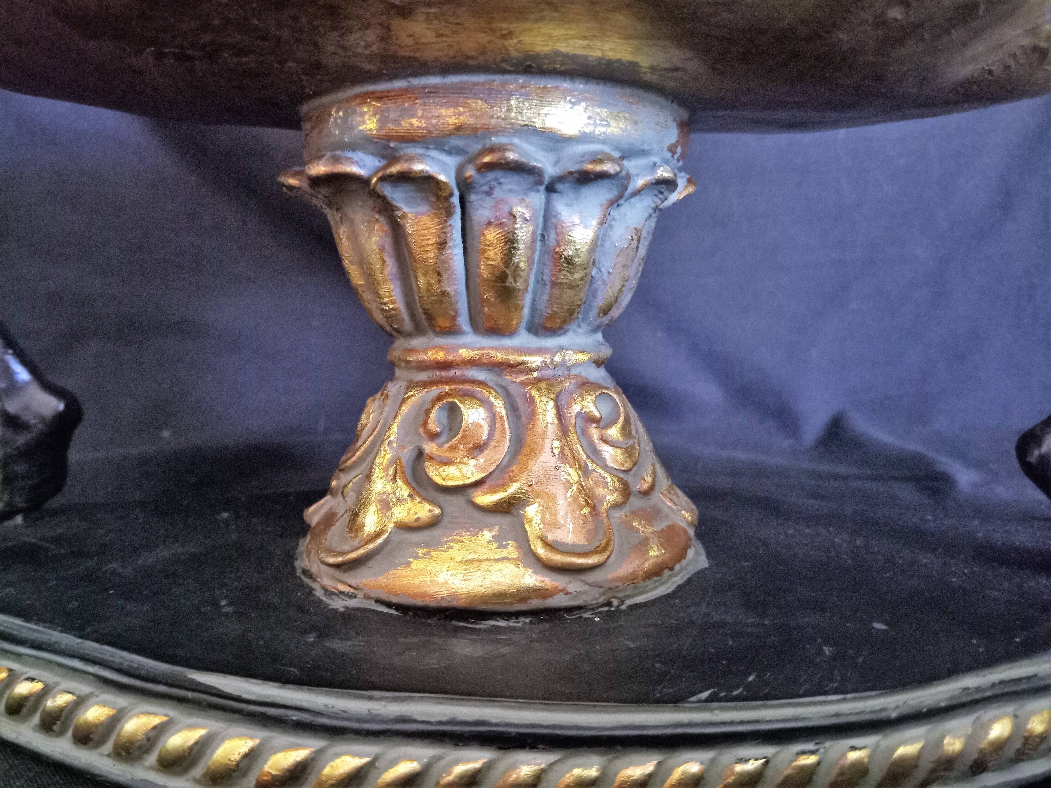 Centerpiece with African characters, plaster, resin and wood