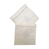 Two matching mixed pillowcases embroidered A B