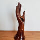 Hand wears brown jewelry , ring, soliflore , vintage French , 50s