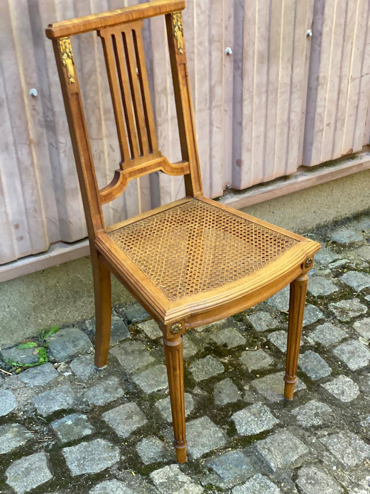 Vintage caned Louis XVI chair in solid gold wood.