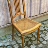 Vintage caned Louis XVI chair in solid gold wood.