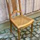 Vintage caned Louis XVI chair in solid gold wood.