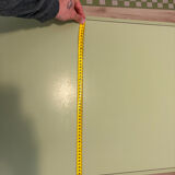 Round extendable folding Formica table with metal legs from the 50s/60s in green.