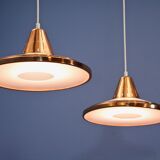 Set of 2 danish hanging lamps in solid copper, 1970s