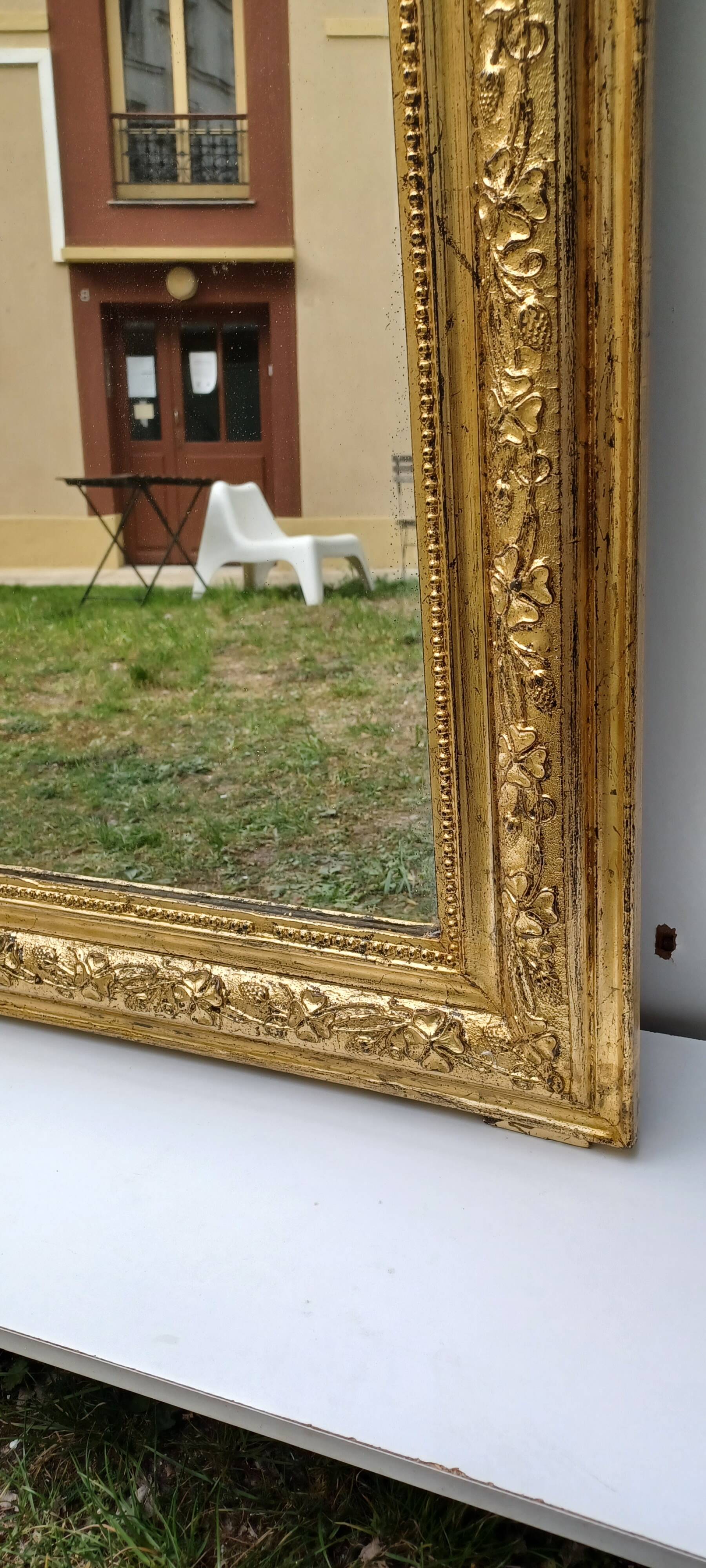Golden mirror in louis-philippe style around 1870