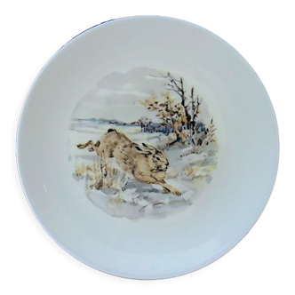 Porcelain plate centered on a running hare