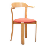 Chair upholstered in red and beech
