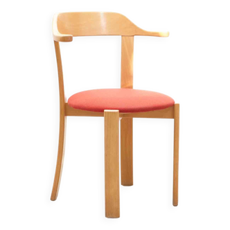 Chair upholstered in red and beech