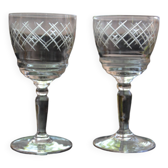 2 small chiseled stemmed glasses