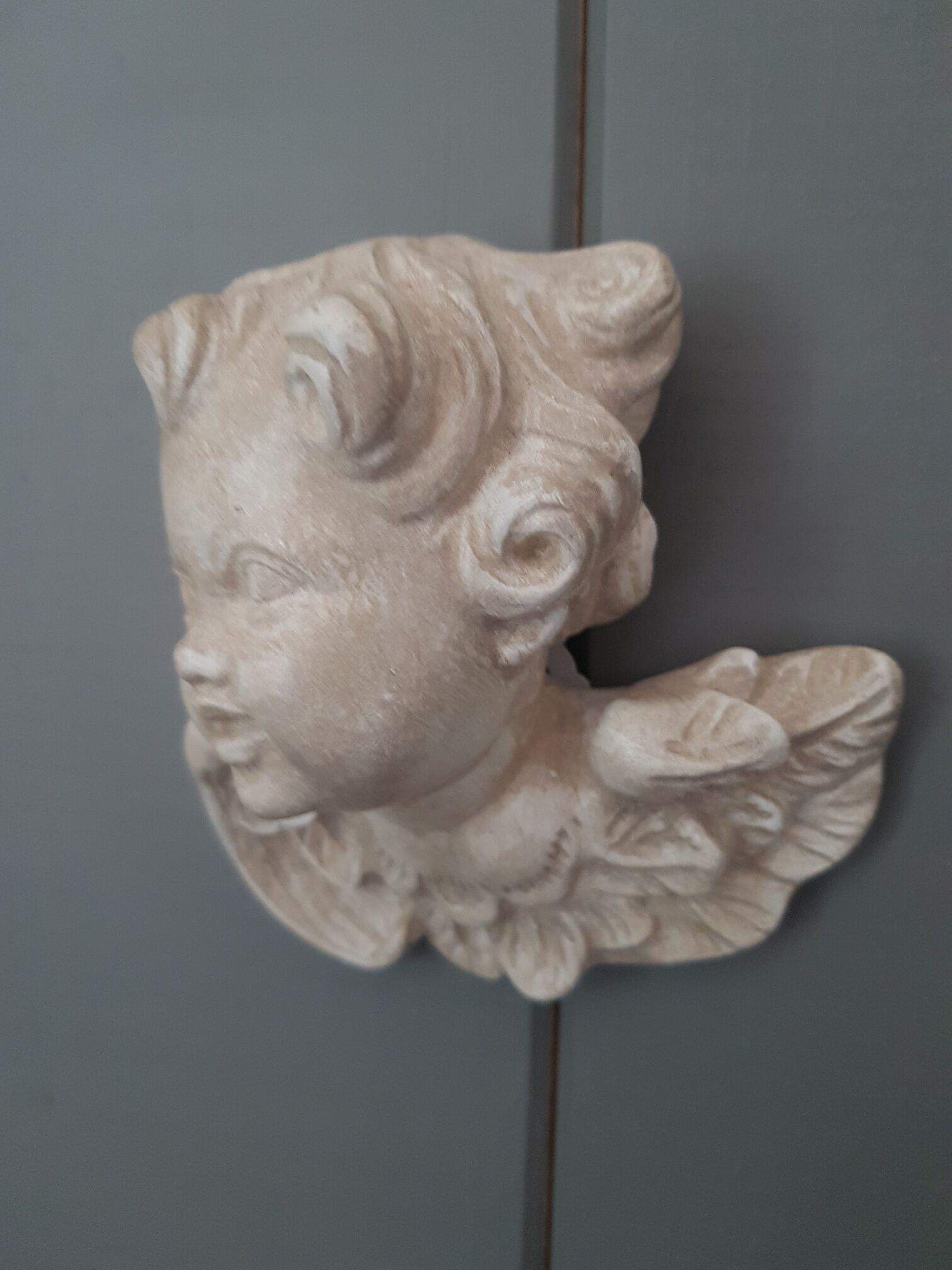 Plaster angel head bust