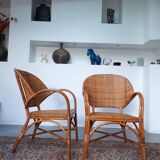Pair of armchairs in braided rattan 70s