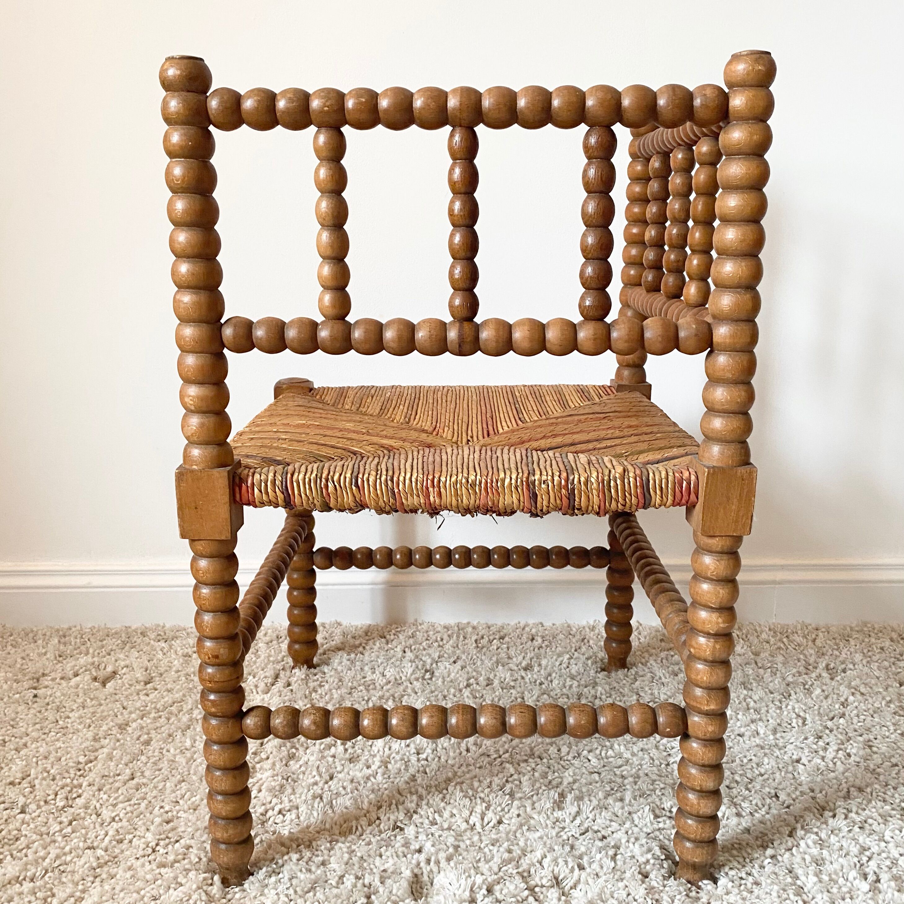 Vintage corner chair in turned oak and straw