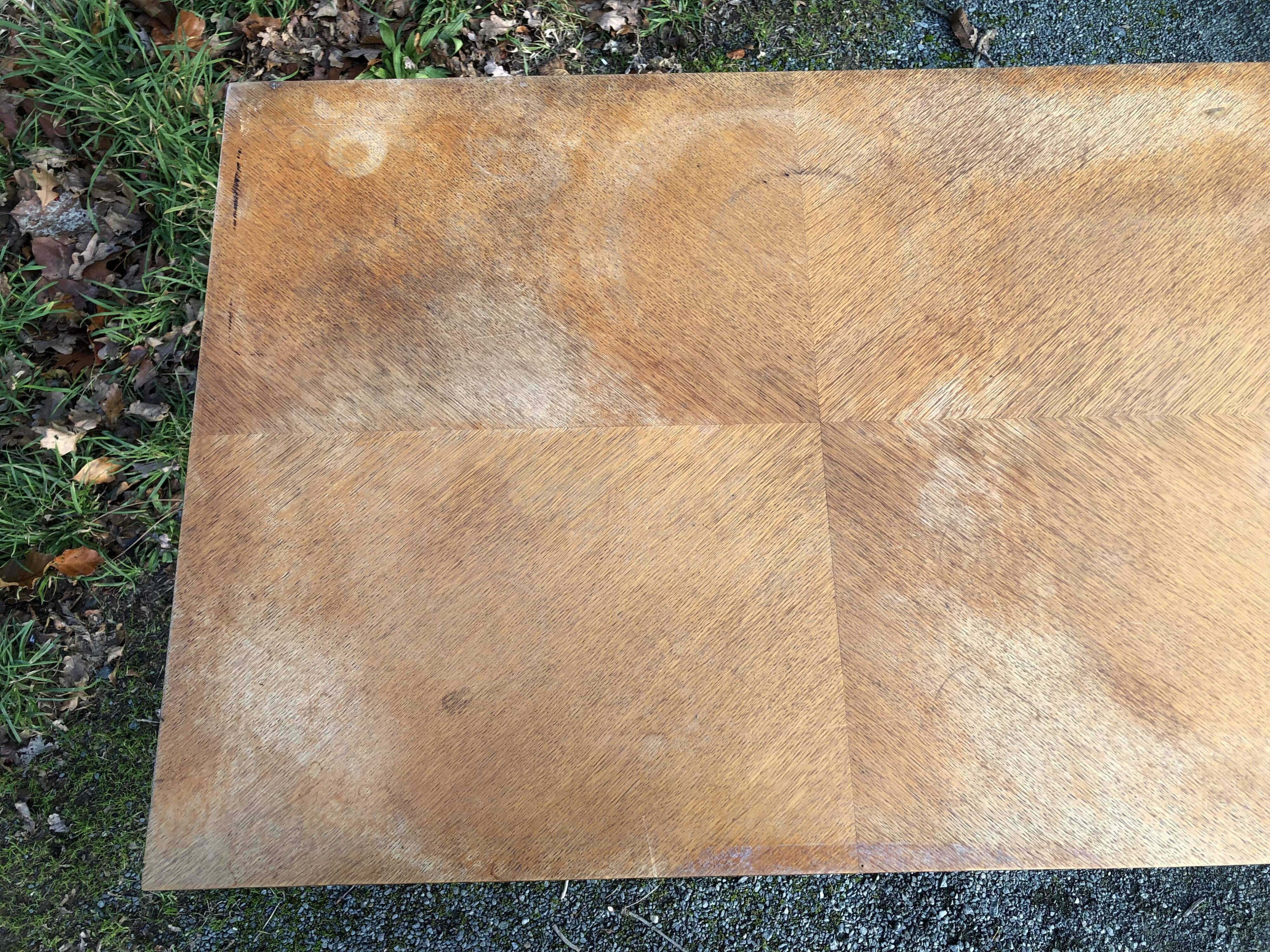 Vintage so-called portfolio table with oak compass base and its oak cp swivel top.