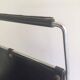 Chrome and black leather magazine rack