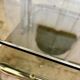 Table basse tubes chrome et verres fumés 1970