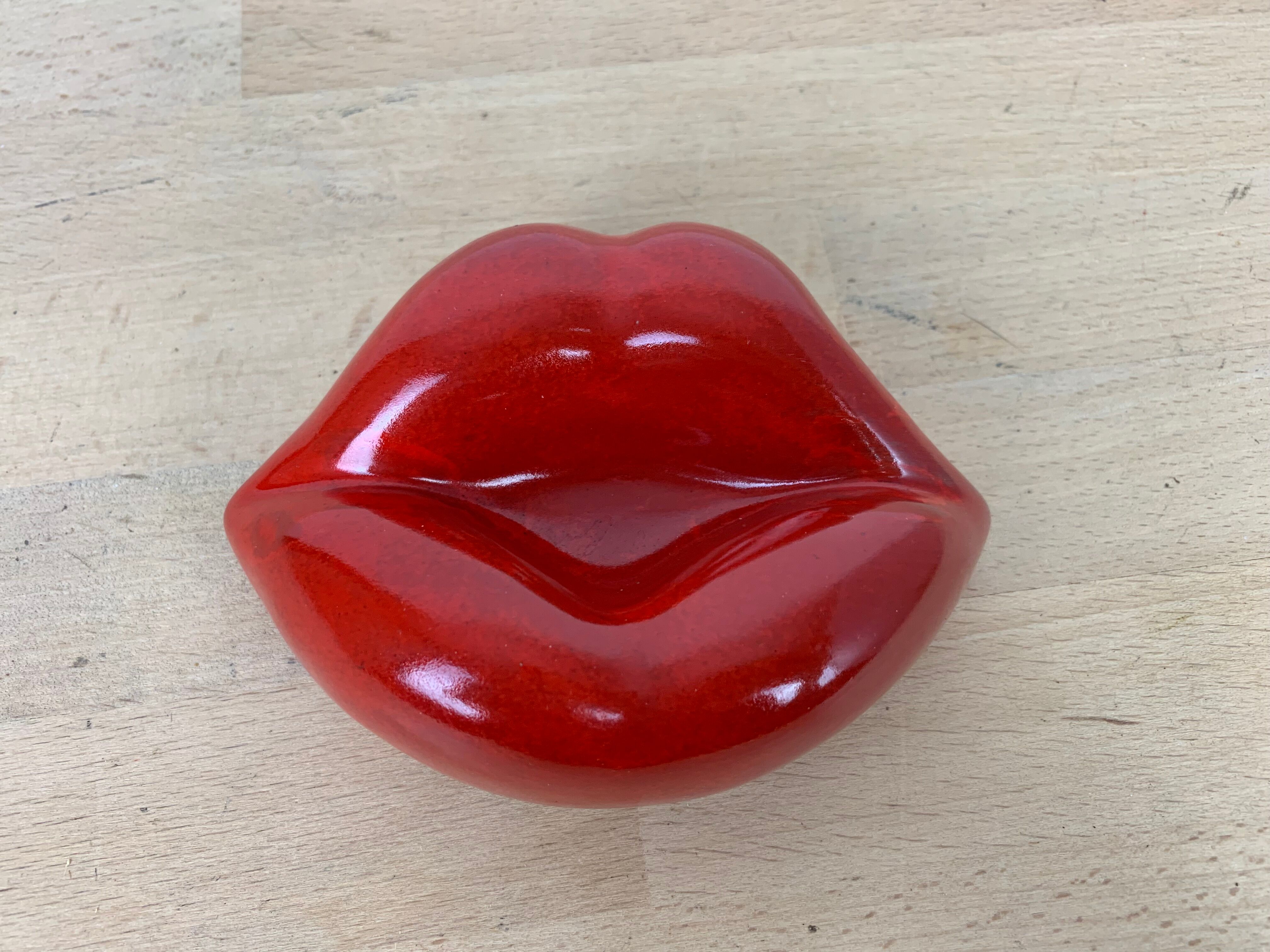 Empty pocket ashtray mouth ceramic red pop