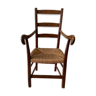 Antique wood and straw armchair