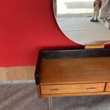 Scandinavian teak dressing table with a large round mirror.
