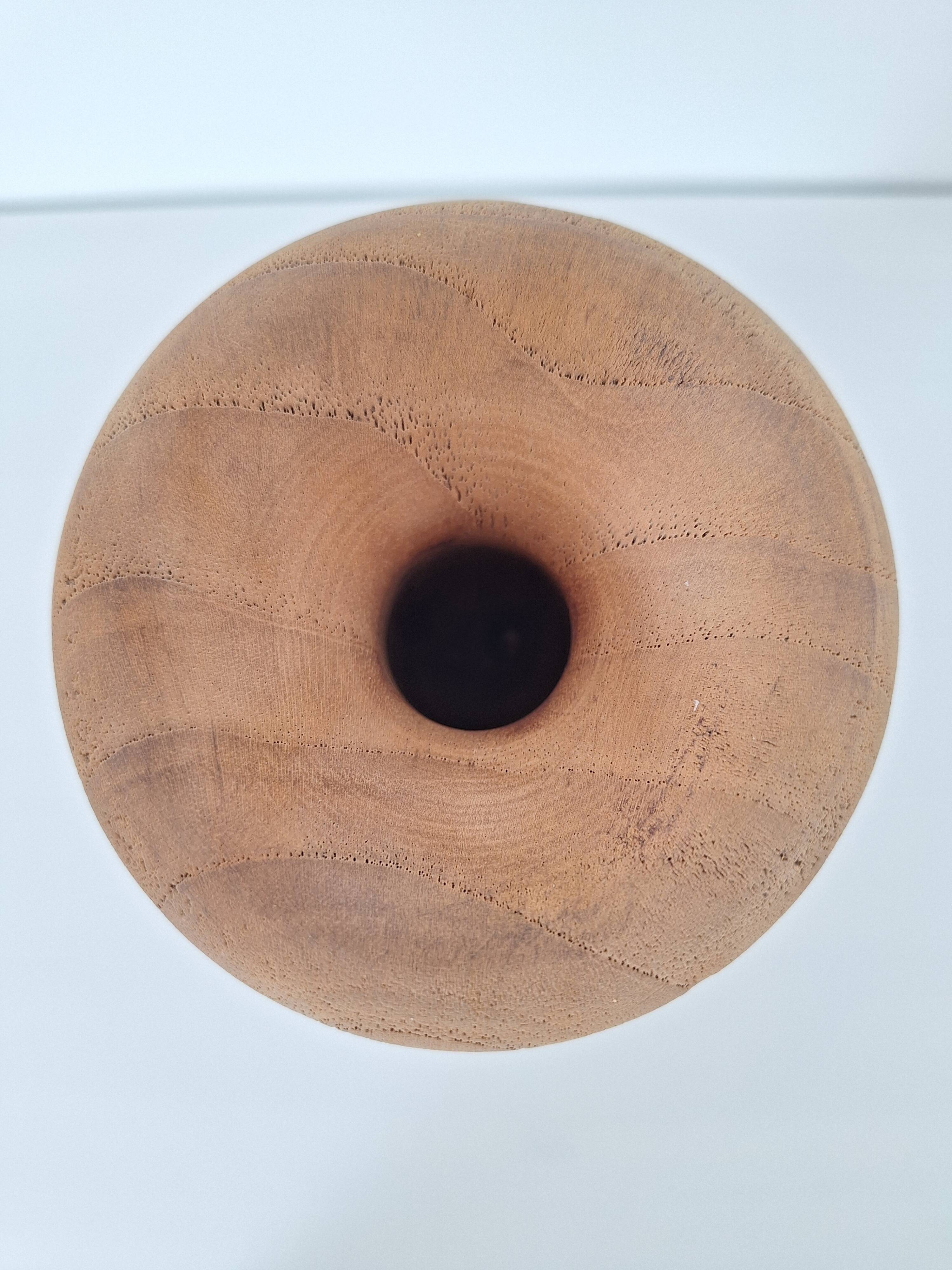 Carved solid wood vase